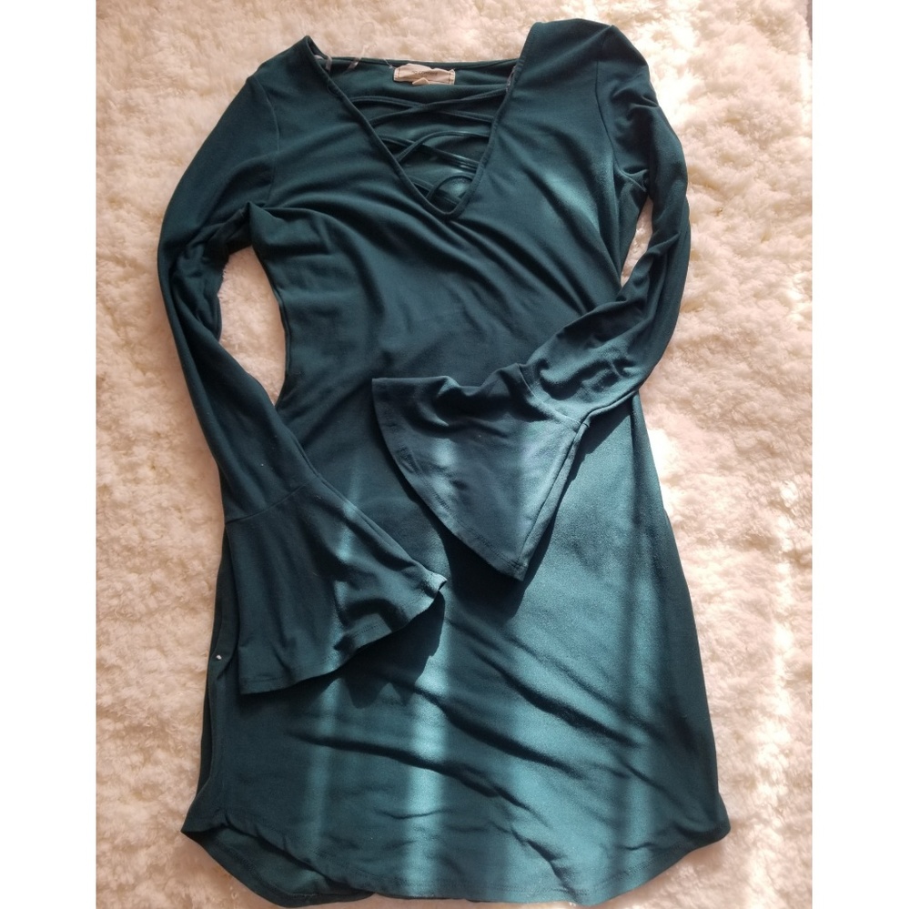 Dress with long bell sleeves
